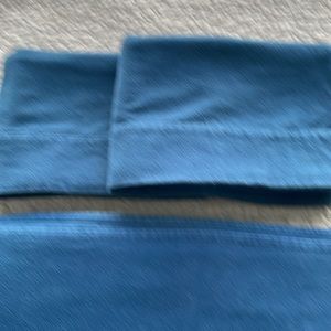 LL Bean 100% cotton flannel sheets. 1 flat Queen sheet and 2 std.pillow cases.